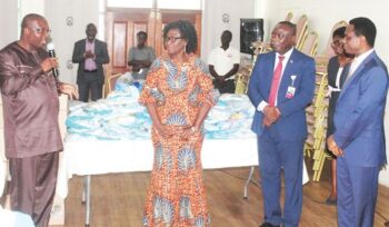 Mr Alexander Abban (left), Deputy Minister of Health, making some remarks after the presentation of the items. Also in the photograph are Rev Veronica Darko (2nd left), Chairperson, 14th Governing Council, Nursing and Midwifery Council, and Apostle Eric Nyamekye (right), Chairman, Church of Pentecost. Picture: Maxwell Ocloo